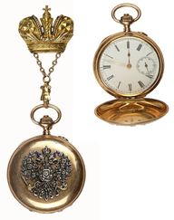 Лот №171. Подарочные дамские часы с Императорским орлом, украшенным бриллиантами из Кабинета Его Императорского Величества, с шатленом.